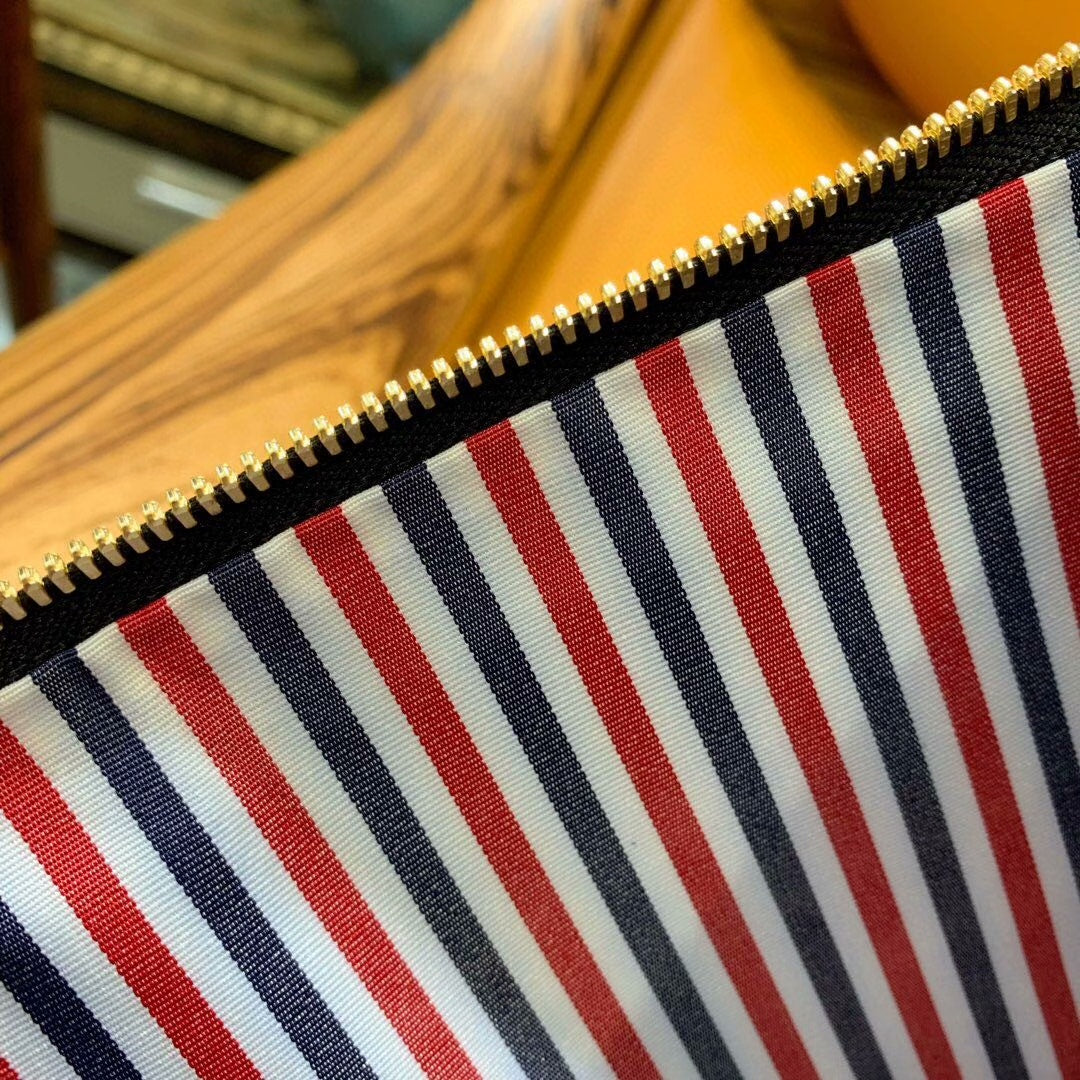 Premium Leather Clutch Bag - Signature Three-Color Woven Design